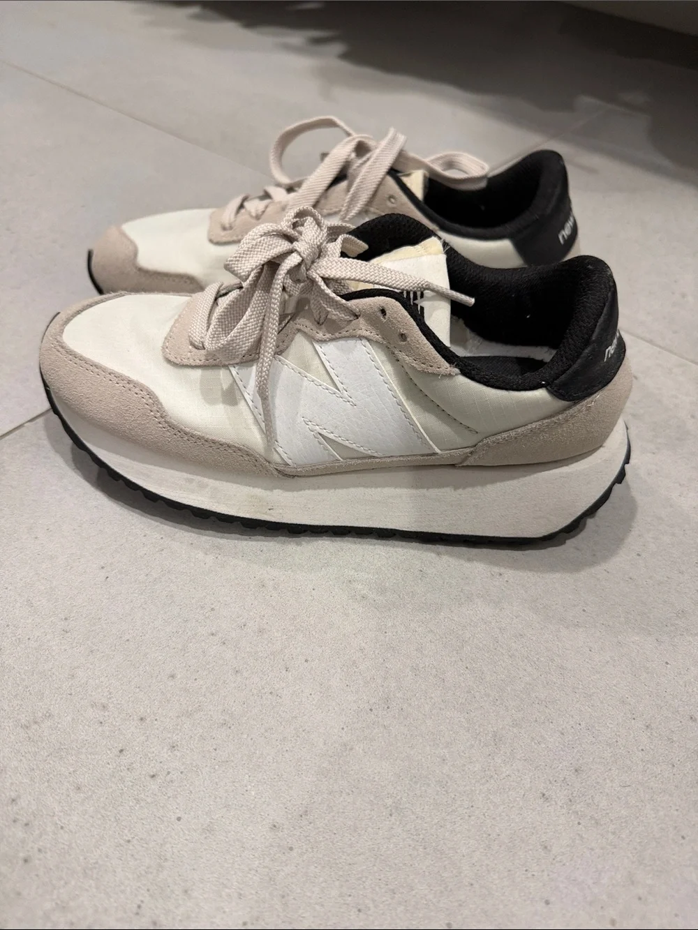 New Balance Women’s Cream and White Platform Sneakers